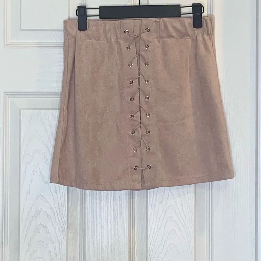 Skylee Collection light pink mini skirt Size medium
